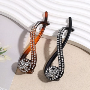 Pince à cheveux banane élégante avec strass en coloris écaille et noir chic