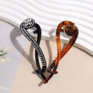 Barrettes bananes élégantes avec strass en noir et motif écaille de tortue ambre