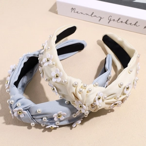 Fashionable knotted headbands with pearl and 3D flower accents in light blue and beige