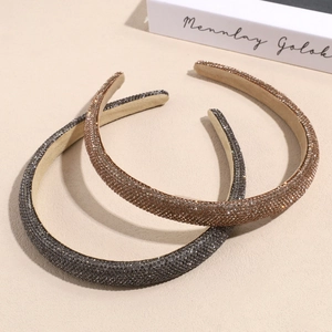 Sparkling full crystal sponge headbands in gold and dark grey with high dome padded design