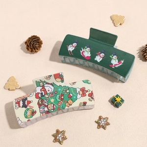 Christmas hair claws set with snowman and festive patterns on a seasonal background