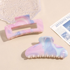 Chic marble pattern hair claw clips set in pastel pink and purple gradient for women