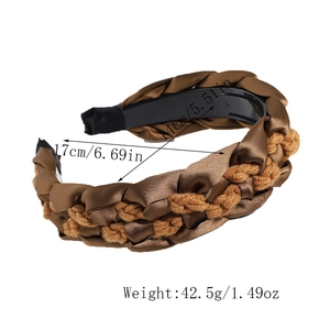 Detailed view of woven fabric headband showing bronze silk texture and non-slip inner teeth