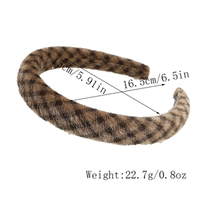 Detail view of leopard print plush headband with measurement labels 16.5cm by 15cm