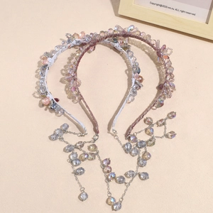 Serre-tête exquis en perles et cristaux avec des pampilles scintillantes en rose doux