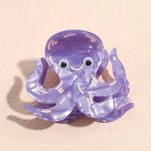 Detail of creative purple octopus hair claw made of premium marbled acetate material