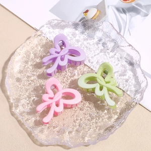 Three-piece set of sweet candy-colored hollow butterfly hair clips in purple pink and green