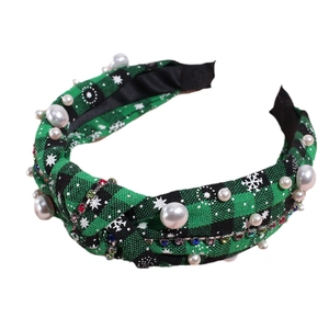 Christmas knotted headband with green plaid fabric, white pearls, and snowflake details