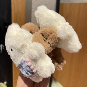 Cute plush rabbit hair claw clip with white and brown faux fur for winter hairstyles