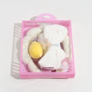 White plush bow headband and wristband spa set with yellow makeup sponge in pink gift box