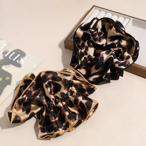 Elegant leopard print silk scrunchies set for ponytail styling and hair fashion