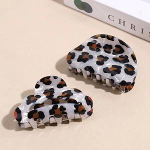 Set of two leopard print acetate hair claws in creamy beige and brown tortoise shell