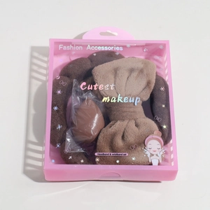 Brown sponge headband and wristband set with makeup blender in pink gift box