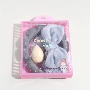 Pink gift box set with plush headbands and makeup sponge for face washing routine