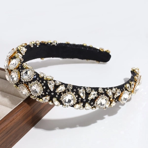 Close-up of luxury velvet headband with sparkling crystal rhinestones and golden settings