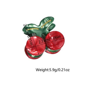 Detail view of mini cherry hair claw clip showing size 2.7cm and resin material