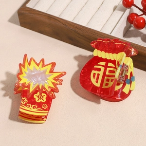 New Year hair claw set with red acrylic firework and fortune bag designs for women