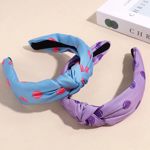 Serre-têtes larges noués avec imprimés de balles de tennis en tissu bleu et violet