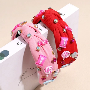 Breite Haarreifen in Pink und Rot mit bunten Strasssteinen und süßen Süßigkeiten-Charms