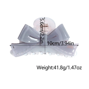 Bow hair claw clip dimensions measuring 10cm x 5.6cm and weighing 41.8g in grey