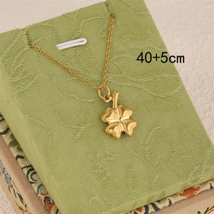 Irregular four-leaf clover pendant necklace in gold stainless steel for women