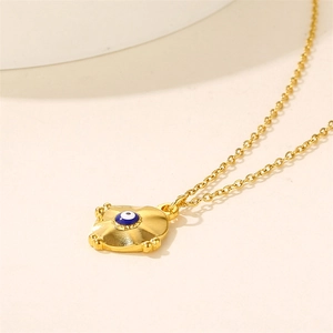 Collier en acier inoxydable 18K doré avec pendentif œil bleu sur décor en céramique