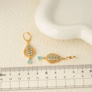 Bohemian 18k gold plated leaf earrings with blue zircons and hollow tassel design