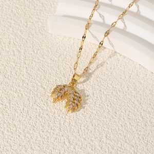 Elegant gold-plated geometric leaf pendant necklace with shimmering zircon stones