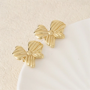 Elegant 18K gold bow-shaped titanium steel stud earrings with stylish wave texture