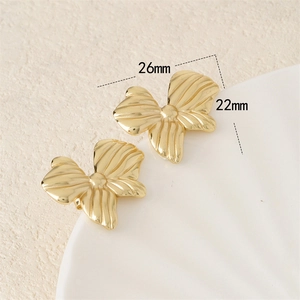 18K gold plated titanium steel bow earrings with radial texture and 26mm size