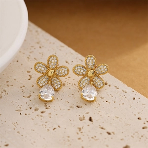 Exquisite gold floral drop earrings with white zircon pavé and teardrop crystal pendants