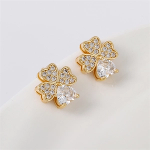 Elegant gold four-leaf clover stud earrings with pavé zircons and teardrop crystal