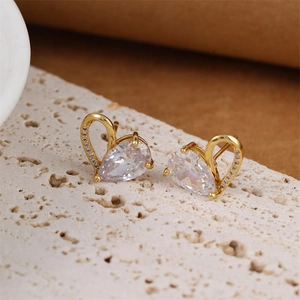 Elegant gold heart-shaped teardrop earrings with zircon stones and hollow heart design