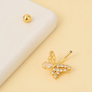 Piercing de nombril papillon doré orné de zircons et design ajouré élégant
