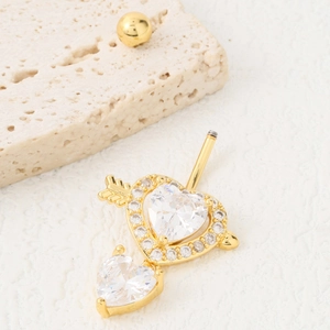 Golden heart-shaped navel ring with cupid arrow and shimmering zircon crystals