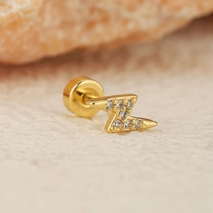 Clou d'oreille éclair doré pour cartilage avec incrustation de pierres scintillantes