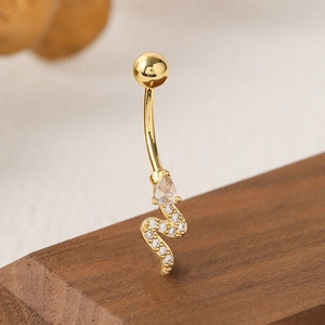 Golden snake-shaped navel ring with sparkling zircon stones and a teardrop gem