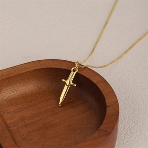 Polished 18K gold plated stainless steel dagger pendant necklace on a snake chain