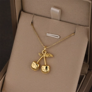 Elegant 18k gold plated cherry pendant necklace on a box chain in a jewelry box