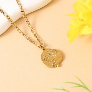 Bohemian gold sun coin pendant necklace with geometric engraving on a stylish chain
