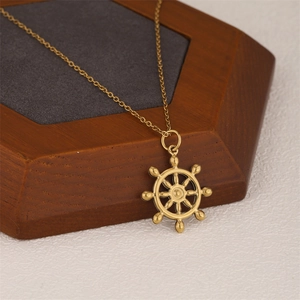 18K gold plated stainless steel nautical ship wheel pendant necklace on wooden stand