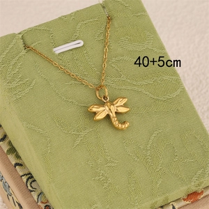 Polished gold dragonfly pendant necklace with adjustable chain for women
