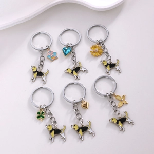 Set of six cartoon beagle dog keychains with colorful enamel charms and heart pendants