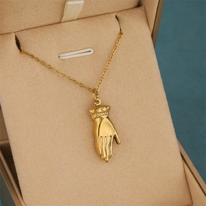 Gold palm hand pendant necklace for women with minimalist chain in jewelry box