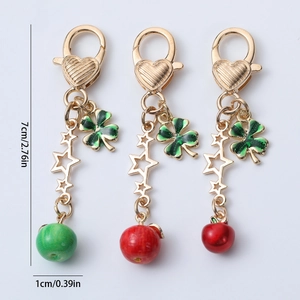 Cute apple fruit keychain with golden star and four-leaf clover charms for bag decoration