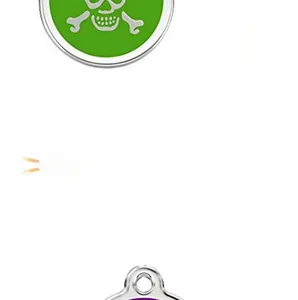 Detail of metal pet ID tags with skull patterns in green, pink, and purple enamel