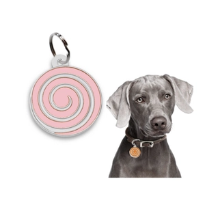 Macro detail of donut pattern pet ID tag and pet wearing the orange spiral charm