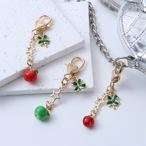 Chic gold alloy apple and cherry keychains with enamel clover and heart hooks