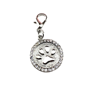 Sparkling paw print charm with clear rhinestones and silver-tone lobster clasp