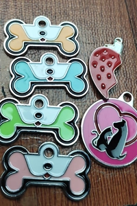 Zinc alloy pet ID tags in bone and strawberry shapes with colorful enamel patterns